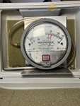 Dwyer Magnehelic Differential Pressure Gauge Cat. No. 2000-00AV. Fixed Price $100.00.