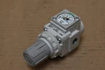 Smc Pneumatic Regulator Part No. AR20K-N01E-Z-B-X406. Fixed Price $20.00.