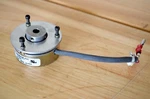 New Inertia Dynamics 1702-0029 Failsafe Electromagnetic Brake 18VDC , 1/4" Shaft. Fixed Price $99.00.