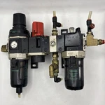Miller Filter Regulator, Exhaust Valve, Distributor, And Lubricator Assembly. Fixed Price $98.00.