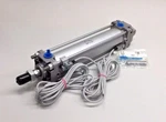 Smc CDA2D50-200Z-J59WL Cylinder With Clevis End And D-J59W Sensor Switches. Fixed Price $165.00.