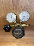Air Products E12-J-N145D Cga Regulator Used Untested. Fixed Price $100.00.