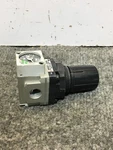 Used Smc AR2001-02BG Modular Pneumatic Regulator. Fixed Price $10.00.