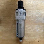 New Smc AW40-N04C-2Z Filter Regulator. Fixed Price $48.00.