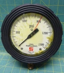 4 1/2" Span Liquid Filled Pressure Gauge 0-1500 Psi Lower Connection. Fixed Price $40.00.