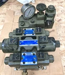 Yuken Directional Valves (4 Pcs) Manifold. Fixed Price $145.00.