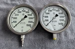 Two Mcdaniel 316 Ss Tube & Socket Liquid Filled Gauge 15000 Psi 7" Dial 1/2" Npt. Fixed Price $67.50.