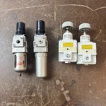 Lot Of 4 Smc Filters And Pneumatic Regulators Ve. Fixed Price $79.99.