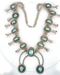 Vintage Native American Sterling Silver Blue Turquoise Squash Blossom Necklace. Fixed Price $1980.00.
