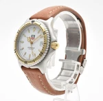 Tag Heuer S/el WI1250-KO Quartz 33MM Men's Watch White Dial Leather Near Mint. Fixed Price $469.99.