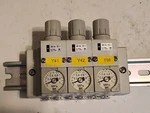 (3)SMC ARM11BA1-R06-A Regulator Manifold Block Module, Set Pressure: 0.05-0.7MPA. Fixed Price $134.99.