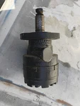 New Re 013999 Hydraulic Roller Stator Motor Aftermarket For White. Fixed Price $899.00.